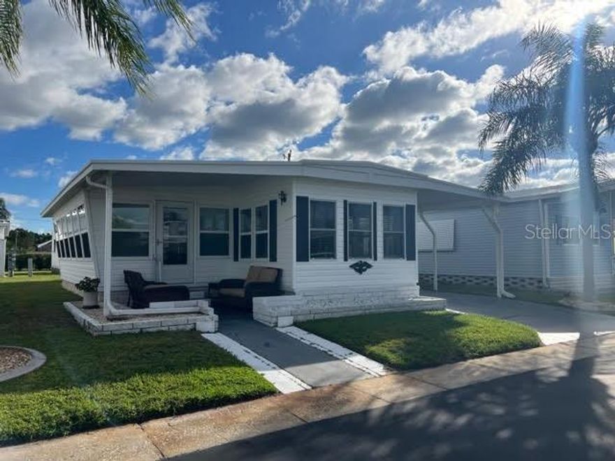 Enjoy the Florida lifestyle in this charming single-wide located in the highly desirable 55+ community of Lake Highlander. This well-maintained home features a kitchen, comfortable living space, two bedrooms and one full bathroom. Huge bonus Florida room that is bright and the perfect spot to enjoy your morning coffee. Furnished and move-in ready, it's the perfect seasonal retreat or year-round residence. Lake Highlander is golf cart friendly and offers a clubhouse, heated pool, and active social events, all just minutes from downtown Dunedin, the Pinellas Trail, and Gulf beaches.
