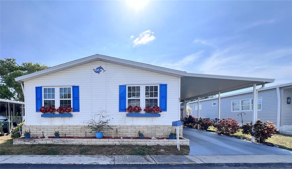 Photo of 51 Pindo Palm Street E, Largo, FL 33770 (MLS # TB8533199)