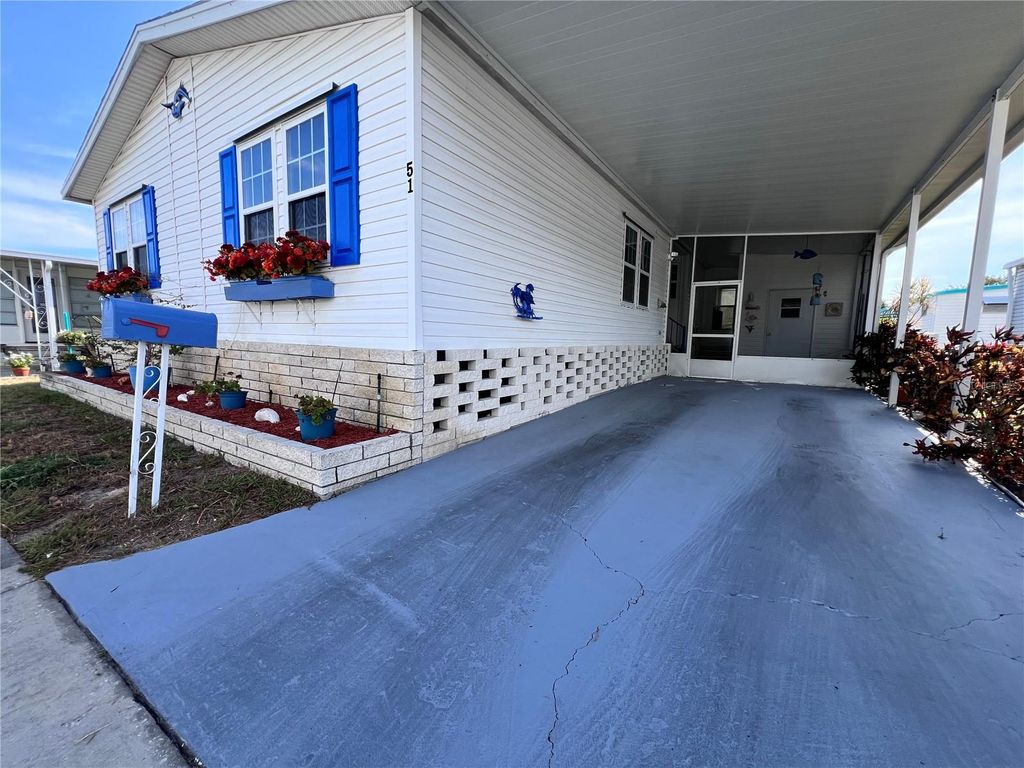 Photo of 51 Pindo Palm Street E, Largo, FL 33770 (MLS # TB8533199)