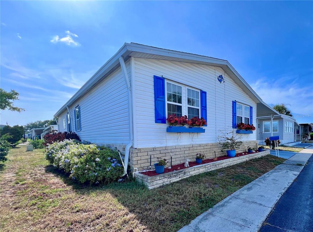 Photo of 51 Pindo Palm Street E, Largo, FL 33770 (MLS # TB8533199)