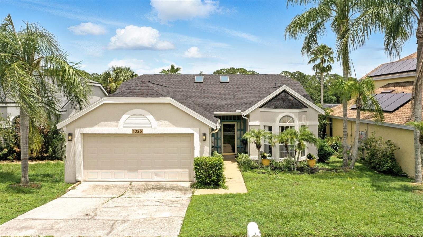 Welcome to this beautifully updated 3-bedroom, 2-bathroom home in the desirable Alafaya Woods community—where comfort, style, and location come together effortlessly. From the moment you step inside, you'll be greeted by soaring vaulted ceilings and two skylights that bathe the spacious living room in natural light, creating a bright and inviting atmosphere. Gleaming tile and real wood flooring flow throughout the home, enhancing its warmth and timeless appeal. Recent upgrades include a 2023 roof, updated plumbing, fresh interior and exterior paint, and all-new gutters, ensuring peace of mind for years to come. The thoughtfully designed eat-in kitchen now features a charming coffee bar, perfect for your morning routine or casual entertaining. Step outside to the expansive screened-in lanai and take in tranquil views of the pond and conservation area—with no rear neighbors, it’s your private escape to nature. Zoned for Seminole County’s top-rated schools, this home is also minutes from major employers like Siemens and Research Park, and close to Full Sail University, The University of Central Florida, and Seminole State College. Enjoy shopping, dining, and entertainment at nearby Oviedo on the Park, and reach international airports in just over half an hour. This meticulously maintained, move-in-ready home is a rare find. Don’t miss your opportunity to own a peaceful, picture-perfect Florida retreat!