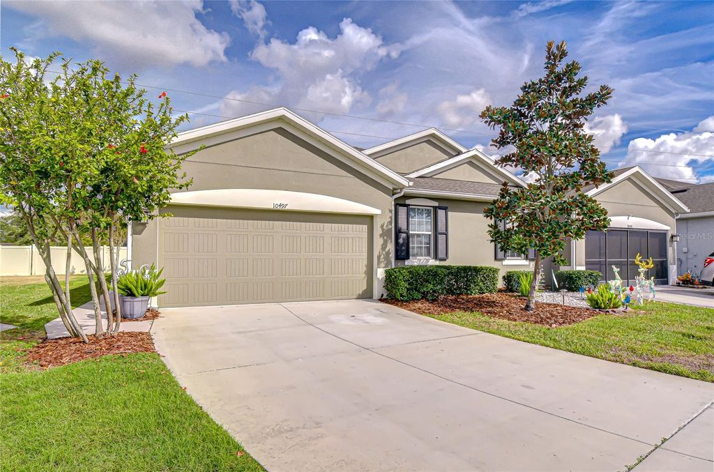 Photo of 10497 Heron Hideaway Loop, Land O Lakes, FL 34638 (MLS # TB8451381)