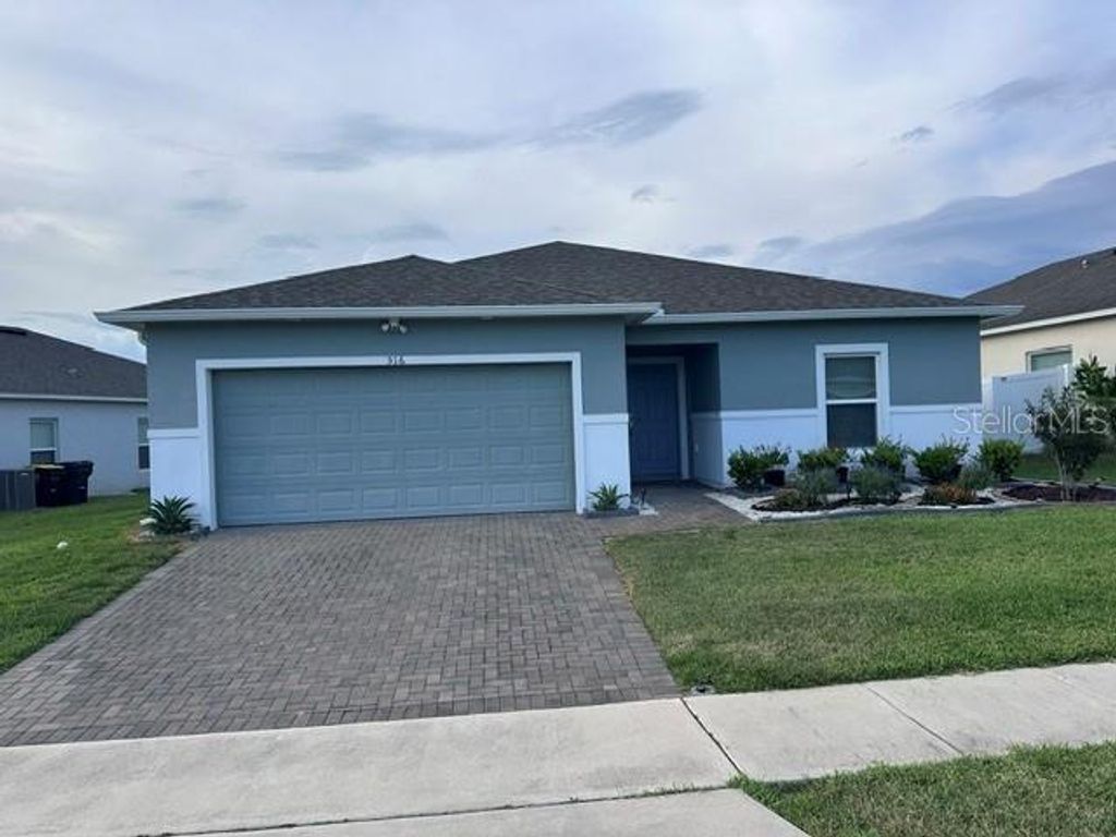 Photo of 516 Ogelthorpe Drive, Davenport, FL 33897 (MLS # O6409047)
