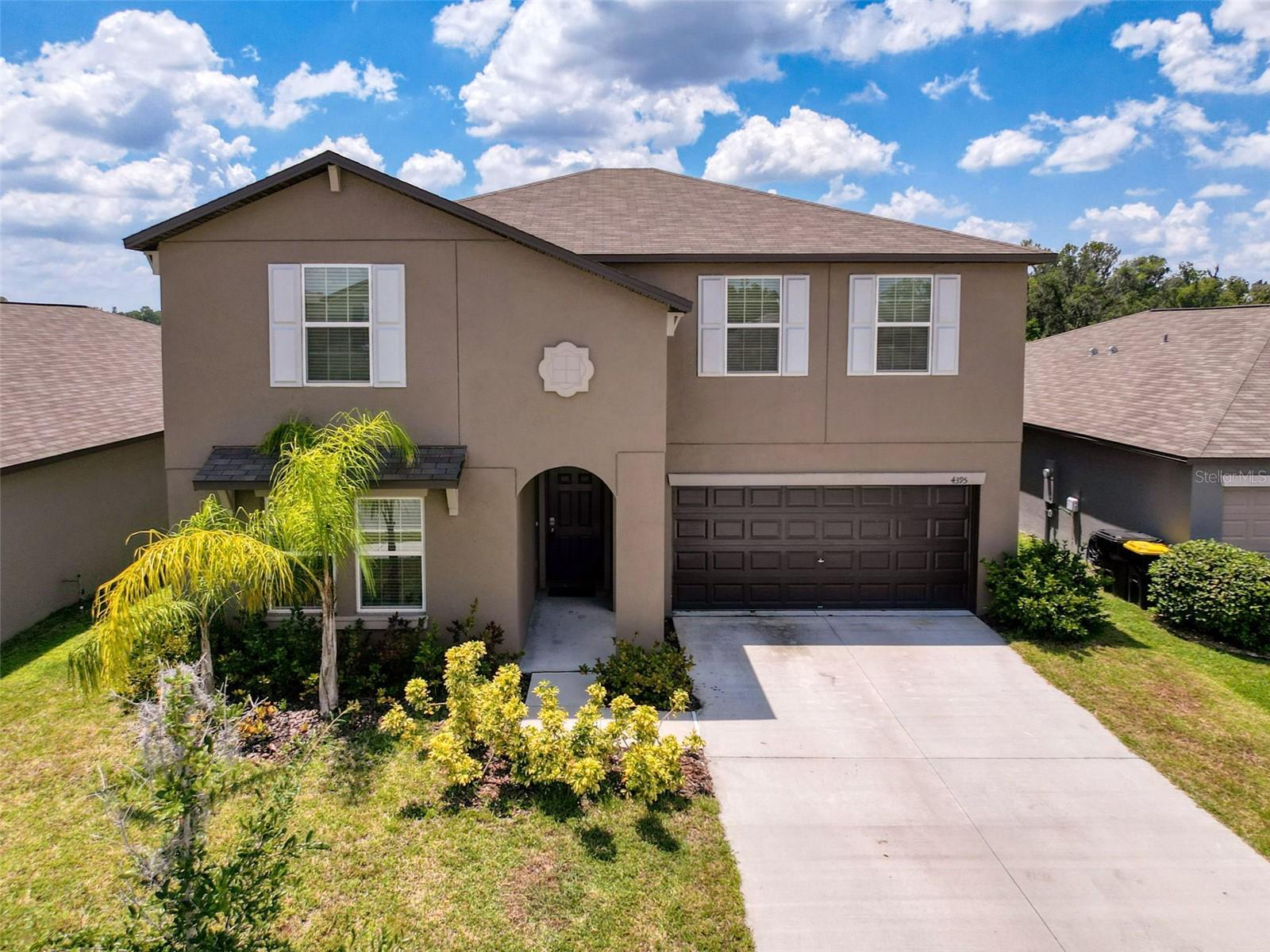 Built in 2023 on a premium lakefront lot with no rear neighbors & tranquil lake views, this 6-bed, 3-full bath home with an office/flex room features open-concept living & the largest floor plan in the community at 3,415 sq. ft. Saddle Creek Preserve offers a community pool & dog park, both with serene water views. The kitchen is a true centerpiece, with granite countertops, an island with a breakfast bar, stainless steel appliances, a walk-in pantry & ample cabinet space. The primary suite is conveniently located on the first floor & includes an en-suite bathroom that features dual sinks, a oversized walk-in shower, private water closet & a walk-in closet. An additional bedroom is also located on the first floor, along with an office/flex room. Upstairs, you’ll find four additional bedrooms, one with a walk-in closet, & a 26x23"4' loft, offering plenty of flexible space to customize to your needs.Enjoy a peaceful lakefront setting in your own backyard, perfect for quiet mornings or relaxing evenings. Or, take a short drive to Historic Downtown Lakeland, just 8 miles away, where you can explore charming boutiques, cozy coffee shops & a vibrant dining scene featuring local favorites like Nineteen61, Harry’s Seafood, Black & Brew Coffee or Vasco Sixty-One’s rooftop bar with scenic views. Is it really Saturday if you haven’t visited the infamous Downtown Farmers Curb Market? The market spans five city blocks & typically features 100–120 vendors. It’s way more than a place to grab veggies...it’s a community hub that showcases the best of local food, creativity & culture. With convenient access to I-4, commuting to Tampa or Orlando is a breeze. Don’t miss this opportunity to own a lakefront home that offers both peaceful surroundings & close proximity to everything Lakeland has to offer. Schedule your showing today!!