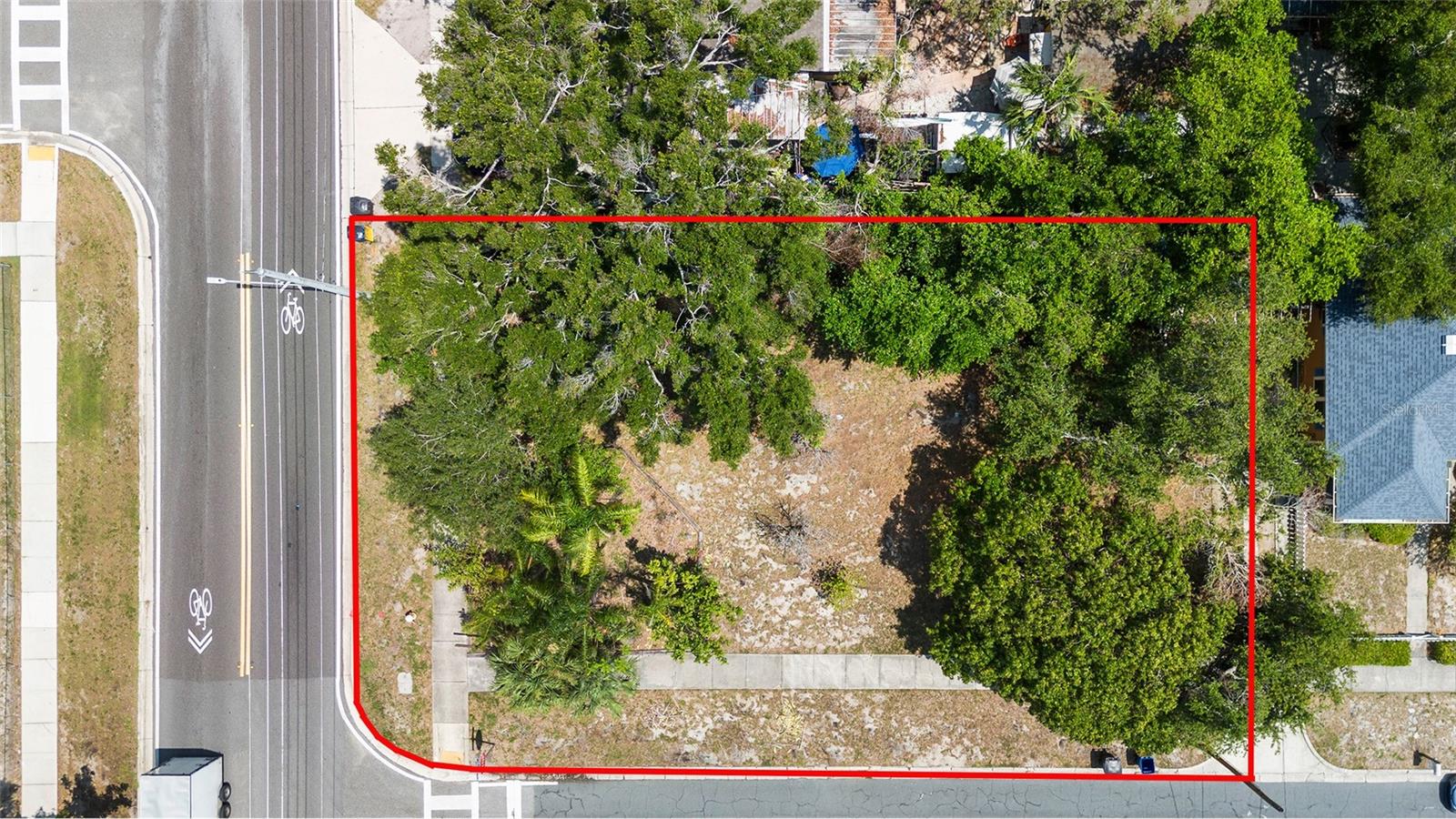 This exceptional corner lot offers a rare opportunity to create your dream home in a sought-after neighborhood. Featuring 0.13 acres, not in a flood zone, this parcel provides ample room for a custom-built residence and convenient access from two streets, Iroquois and N Fort Harrison Ave.
Situated in Old Clearwater Bay, this lot enjoys proximity to Dunedin, Clearwater Beach and everything the beaches have to offer. Top rated schools, parks, golf, and shopping, ensuring both convenience and long-term value. With utilities nearby and zoning favorable for residential development, the groundwork is set for a seamless build. With its prime location and versatile potential, this corner lot is set to deliver flexibility, accessibility, and lasting investment value. Lots 7, 8 and 9 are for sale 90' X 67'. Lot has not been split yet, only the vacant lot is for sale not the house next to it.