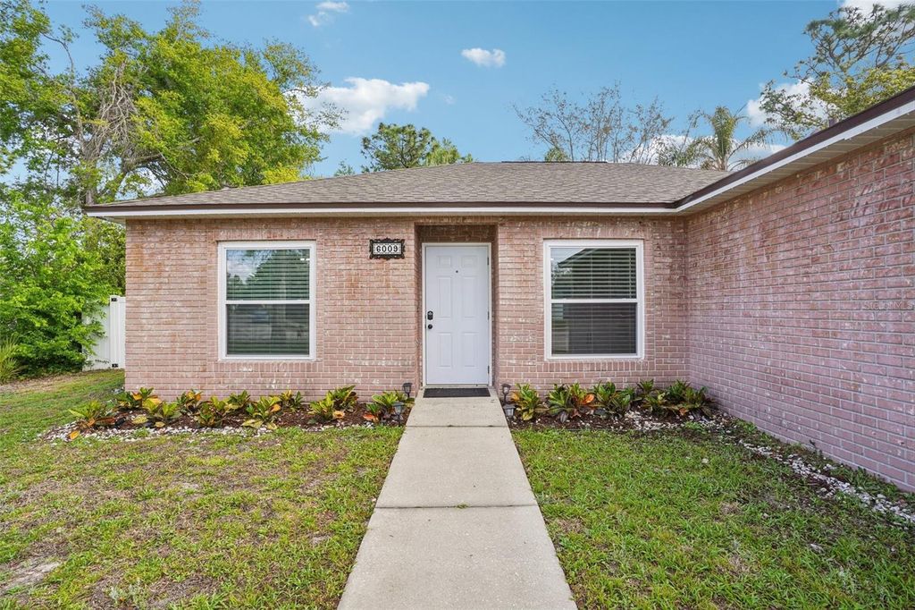 Photo of 6009 Hickory Grove Lane, Port Orange, FL 32128 (MLS # NS1087495)