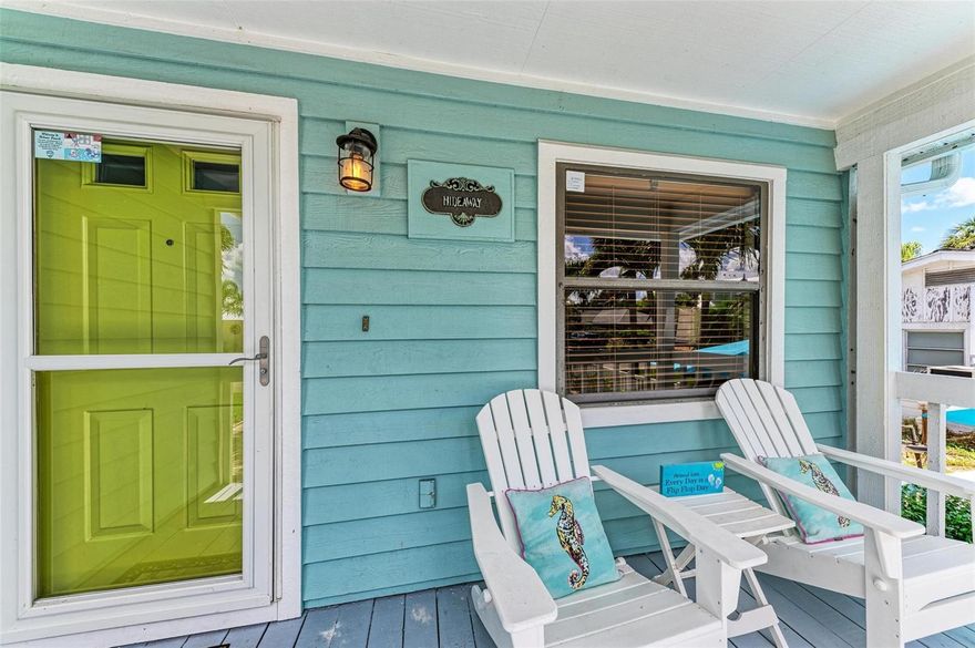 ONE OF A KIND - ELEVATED with a PRIVATE POOL & your own garage, this is like single family home living - for under $1m on Anna Maria Island!  This 2 bed/2 bath picture perfect, island dream is ideally situated on a quiet corner, just two short blocks from the Gulf Beaches!  This UPDATED island sanctuary surrounds you in coastal charm.  The luxury vinyl large plank flooring throughout is ideal for beach living, and ties the open living and dining room together.  The fully renovated kitchen with quartz counters, is equipped with stainless steel appliances and ample shaker style white cabinetry.  Your guests will enjoy their private accommodations just next to their updated full bath with white subway tile surround and new vanity with Moen faucet.  Upstairs you will relish the privacy of your primary retreat.  The sunlight brightens your spacious room that includes a large walk in closet.  Your en suite bath has a glass enclosed shower, with tile bench and pebble stone shower flooring.  And outdoors, you can relax on your front porch, or cool off in YOUR VERY OWN pool!  Embrace the island life in this lovely land condo, and use it as a short term rental when you are away. THERE IS NOTHING LIKE IT at this price - come make it your own today!