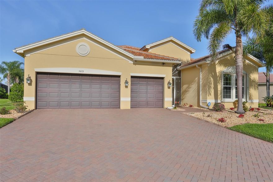 Welcome to this this beautifully updated home, set on one of the largest lots in Valencia Lakes—spanning over a third of an acre. This expansive Den Vizcaya model showcases more than $200,000 in recent upgrades that elevate its refined design, and it stands out as one of the few homes in the community to feature a private pool. The highlight of the home is its exceptional outdoor living space, complete with an outdoor kitchen and plenty of room for lounging and gathering with family—all while enjoying tranquil pond views and the soothing sound of the fountain. On cooler days, unwind in the hot tub and spa, or take advantage of the beautifully heated pool that includes pool lighting, a waterfall, and a fountain for year-round comfort. This generously sized home features 3 bedrooms, 3.5 bath, plus a built-in home office, which can easily be converted into a fourth bedroom by removing the built-in desks if desired. As you enter the grand foyer, you’re immediately greeted by exquisite custom woodwork, including crown molding, along with beautifully finished windows and sliding doors that add distinctive charm to the home. This home is outfitted with an impressive array of premium features, including an AC system with humidity control, a whole-house air purifier, bathroom heat lamps, an insulated garage door, and enhanced garage storage. The lanai is pre-wired for speakers, and the property is wired for perimeter security cameras. For added peace of mind, the home includes accordion hurricane shutters and outdoor security lighting. Additional conveniences include a whole-house intercom system and easy-open, self-gliding sliding doors leading to the pool area. Recent upgrades—such as a new water heater, pool filter, salt cartridge, air handler, and water softener—further elevate this home as a perfect blend of style, comfort, and functionality. The chef’s kitchen offers extensive upgraded cabinetry and generous granite counter space, perfect for meal preparation and entertaining guests. If you’re not a fan of the kitchen island  they can be easily removed. Start living the dream today in the Valencia Lakes community, featuring outstanding amenities including a 40,000 sq. ft. clubhouse, 24-hour fitness center, fitness classes, clubs, and a full calendar of events and concerts in the spacious social hall. Residents also enjoy game rooms, a sauna/spa, pools, softball field, RV and boat storage, tennis and pickleball courts, a community garden, and much more. The community offers a vibrant clubhouse, inviting pools, and an active social lifestyle. Conveniently located near Sarasota, St. Petersburg, and Tampa, you’ll have easy access to professional sports, arts and cultural attractions, and some of America’s award-winning beaches. Live where others only dream of vacationing. Schedule your showing today and discover the charm of this beautiful, move-in ready, custom-built home—you’re sure to fall in love!