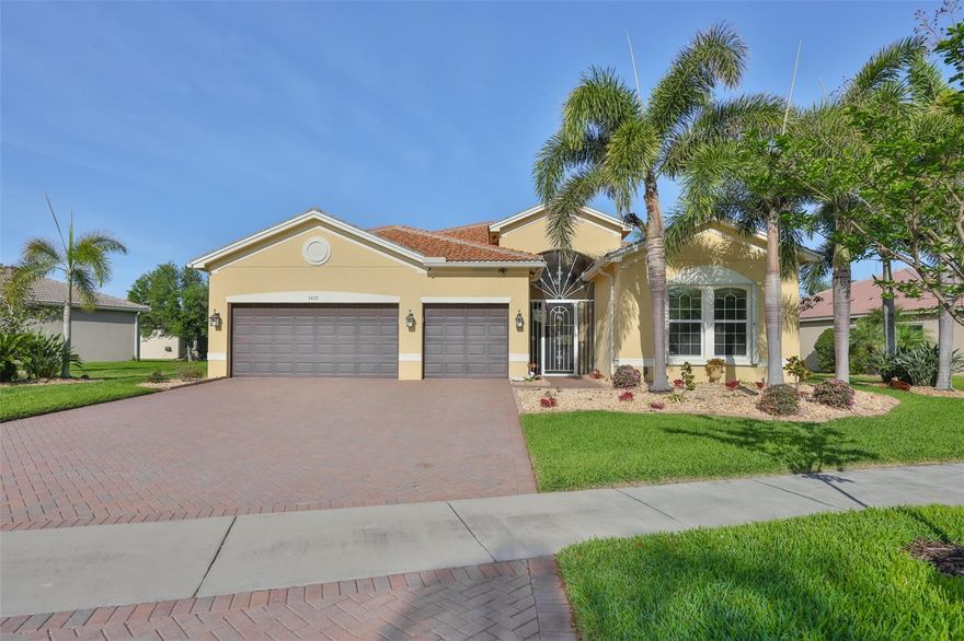 One or more photo(s) has been virtually staged. Welcome to this this beautifully updated home, set on one of the largest lots in Valencia Lakes—spanning over a third of an acre. This expansive Den Vizcaya model showcases more than $200,000 in recent upgrades that elevate its refined design, and it stands out as one of the few homes in the community to feature a private pool. The highlight of the home is its exceptional outdoor living space, complete with an outdoor kitchen and plenty of room for lounging and gathering with family—all while enjoying tranquil pond views and the soothing sound of the fountain. On cooler days, unwind in the hot tub and spa, or take advantage of the beautifully heated pool that includes pool lighting, a waterfall, and a fountain for year-round comfort. This generously sized home features 3 bedrooms, 3.5 bath, plus a built-in home office, which can easily be converted into a fourth bedroom by removing the built-in desks if desired. As you enter the grand foyer, you’re immediately greeted by exquisite custom woodwork, including crown molding, along with beautifully finished windows and sliding doors that add distinctive charm to the home. This home is outfitted with an impressive array of premium features, including an AC system with humidity control, a whole-house air purifier, bathroom heat lamps, an insulated garage door, and enhanced garage storage. The lanai is pre-wired for speakers, and the property is wired for perimeter security cameras. For added peace of mind, the home includes accordion hurricane shutters and outdoor security lighting. Additional conveniences include a whole-house intercom system and easy-open, self-gliding sliding doors leading to the pool area. Recent upgrades—such as a new water heater, pool filter, salt cartridge, air handler, and water softener—further elevate this home as a perfect blend of style, comfort, and functionality. The chef’s kitchen offers extensive upgraded cabinetry and generous granite counter space, perfect for meal preparation and entertaining guests. If you’re not a fan of the kitchen island  they can be easily removed. Start living the dream today in the Valencia Lakes community, featuring outstanding amenities including a 40,000 sq. ft. clubhouse, 24-hour fitness center, fitness classes, clubs, and a full calendar of events and concerts in the spacious social hall. Residents also enjoy game rooms, a sauna/spa, pools, softball field, RV and boat storage, tennis and pickleball courts, a community garden, and much more. The community offers a vibrant clubhouse, inviting pools, and an active social lifestyle. Conveniently located near Sarasota, St. Petersburg, and Tampa, you’ll have easy access to professional sports, arts and cultural attractions, and some of America’s award-winning beaches. Live where others only dream of vacationing. Schedule your showing today and discover the charm of this beautiful, move-in ready, custom-built home—you’re sure to fall in love!