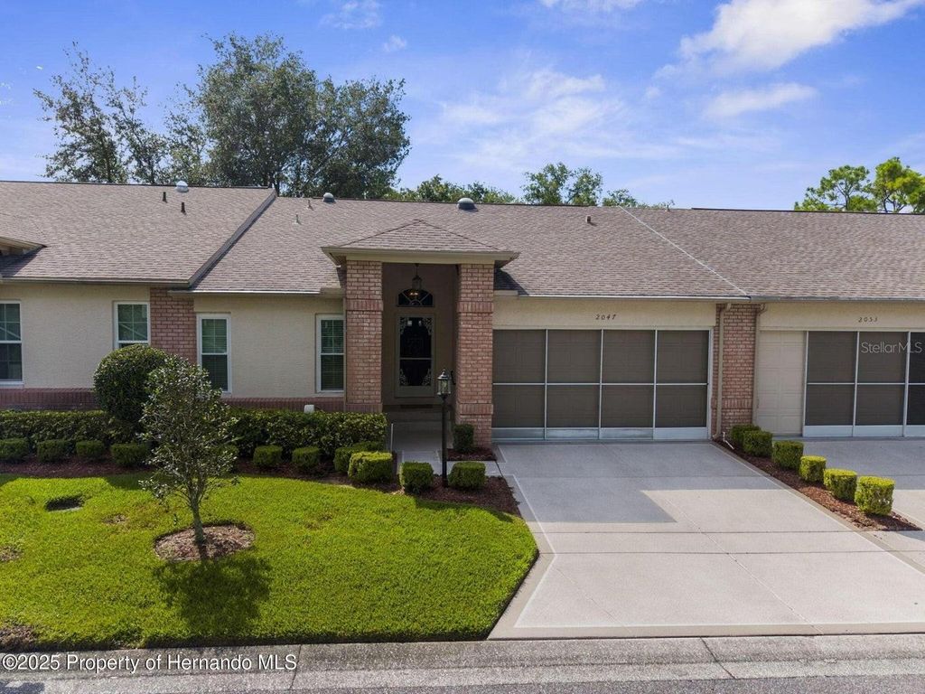 Photo of 2047 Springmeadow Drive, Spring Hill, FL 34606 (MLS # J997366)