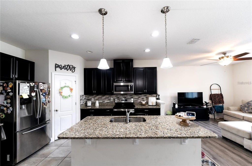 Photo of 2749 Pleasant Cypress Circle, Kissimmee, FL 34741 (MLS # S5155613)