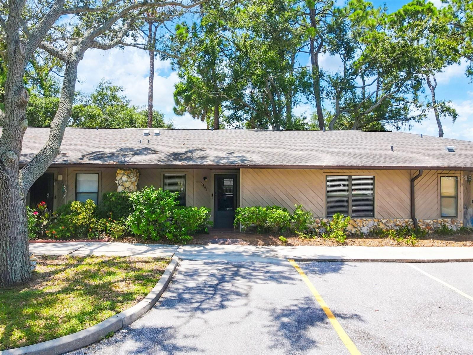 Welcome to this beautifully maintained 2-bedroom, 2-bathroom condo in the desirable Heatherwood community in Bradenton. Centrally located with quick access to shopping, dining, and the stunning Gulf beaches, this home combines convenience with comfort. Inside, you’ll find new luxury vinyl plank flooring, brand-new carpet in the bedrooms, and updated bathrooms with modern fixtures. Both generously sized bedrooms feature en suite bathrooms and large walk-in closets, providing comfort and privacy. And the split bedroom floor plan allows flexibility for a variety of living arrangements. Enjoy plenty of storage space throughout, plus a private rear screened lanai perfect for relaxing. This unit comes complete with all appliances, including a washer and dryer—making it truly move-in ready. Did I mention it comes with a 2-Year Home Warranty, transferable to Buyer at closing? Yes, it does! Don’t miss this opportunity to enjoy low-maintenance Florida living in a prime location! Fees include Cable/Internet, Trash collection, Community Pool, and Grounds & Exterior Maintenance. Make it yours TODAY!
