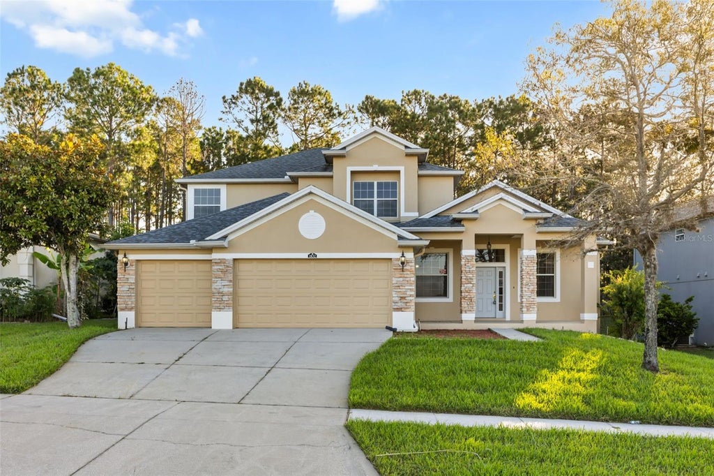 Photo of 1832 Nature Cove Lane, Clermont, FL 34711 (MLS # O6452866)