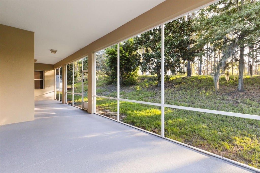 Photo of 1832 Nature Cove Lane, Clermont, FL 34711 (MLS # O6452866)