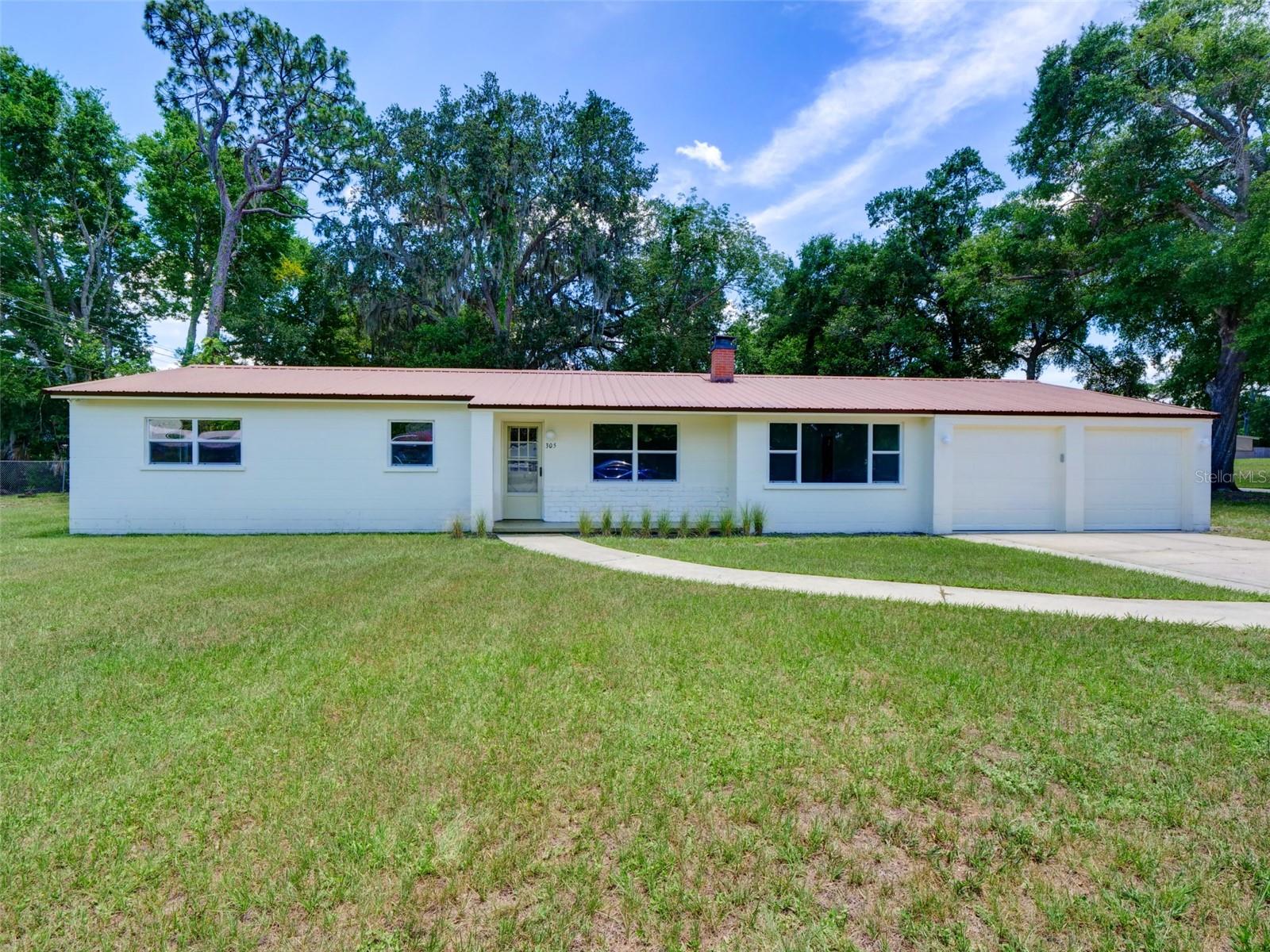 This beautifully updated 4-bedroom, 2-bathroom home offers the perfect blend of midcentury charm and modern upgrades—all on an oversized lot in a peaceful Sanford neighborhood. With 1,783 sq ft of living space, split floor plan, two spacious living areas, a Florida room, and a brand-new kitchen, this one is a must-see!