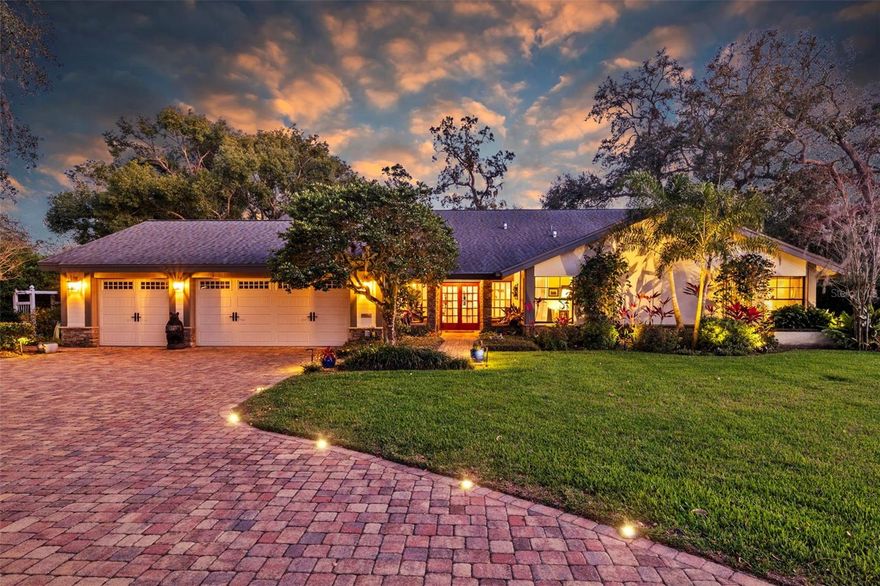 CYPRESS RUN LUXURY HOME IN THE AREA’S MOST EXCLUSIVE GOLF-CENTRIC COMMUNITY, OFFERING LUXE INDOOR AND OUTDOOR LIVING, SPACIOUS FLOORPLAN, SECLUDED LOCATION, FINE CRAFTSMANSHIP AND UPSCALE AMENITIES 
This exceptional home in the prestigious Cypress Run community is an expansive Arthur Rutenberg “Cayman” design residence with 3,465 sq. ft. of interior living space featuring a south-facing covered lanai and enclosed heated saltwater pool suitable for swimming laps.  Beautiful landscaping, lush gardens, mature oaks, hedged paver-driveway, and stone retaining walls make this property impressive. Its location offers views down the fifth fairway and a desirable buffer from course maintenance and tournament activities. The French door entryway opens into a vaulted-ceiling great room with views of the lanai, sparkling blue pool and gardens beyond. Richly textured walls, fine moldings, stained glass, and hardwood floors add warmth and elegance throughout. A sunken reading and conversation area features a wood-burning fireplace and a fully equipped wet bar. The family room’s scenic windows provide a beautiful view of the vast backyard, pergola, and gardens.  A gourmet kitchen features dual ovens, induction cooktop, granite counters, custom cabinetry, modern fixtures, and an adjoining butler’s pantry and laundry room.  Luxury continues in the primary bedroom and adjacent bathroom spa that features elegant gold-toned fixtures, a quartz-topped dual vanity, lighted mirrors, walk-in closet, soaking tub, and direct access to the lanai and pool.  European fine details are found in the “Venetian” powder room and guest bathroom.  
Ideally located near Gulf beaches, Tampa International Airport, and local amenities, with no flood insurance required.  This Cypress Run home stands apart from others in the area, offering timeless elegance, modern conveniences, and an outdoor oasis that’s second to none. Click the Virtual Tour Link (then select Video) & Schedule Your Private Showing Today! All information and measurements are approximate. Buyer to verify.