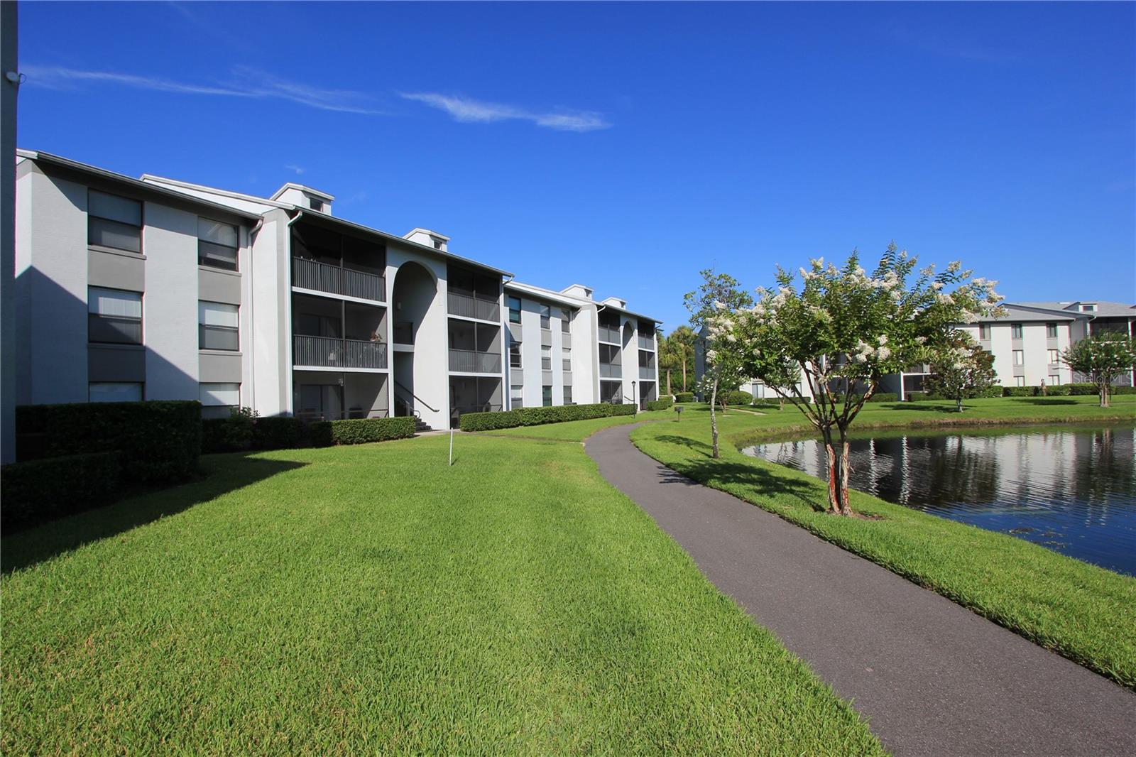 Charming 2-Bedroom, 2-Bath Condo in Gated Sanford Community
Welcome to this beautifully maintained 2-bedroom, 2-bathroom condo located in the desirable Pine Ridge Club II, a gated community in Sanford. Situated on the third floor of one of the newer buildings built in 2004, this home offers privacy, comfort, and convenience.
Step into a spacious open-concept living and dining area, perfect for entertaining or relaxing. Enjoy fresh air and peaceful views from your private screened-in balcony. The kitchen comes fully equipped with appliances, and a washer and dryer are included for your convenience.
The primary suite features a large walk-in closet and a private ensuite bathroom. An additional exterior storage closet provides extra space for outdoor gear or seasonal items. The roof was replaced in 2019 by the HOA, offering added peace of mind.
Ideally located just minutes from major highways, this home is within 5 miles of Orlando-Sanford International Airport, Downtown Lake Mary, Historic Downtown Sanford, and Seminole Towne Center Mall—putting dining, shopping, and entertainment right at your doorstep.
Don’t miss this opportunity to own a low-maintenance home in a prime location!