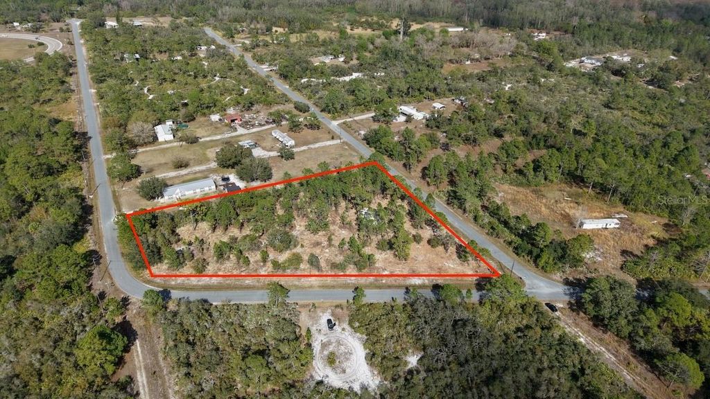 Photo of 5730 Tropical Avenue, Okeechobee, FL 34972 (MLS # TB8467813)