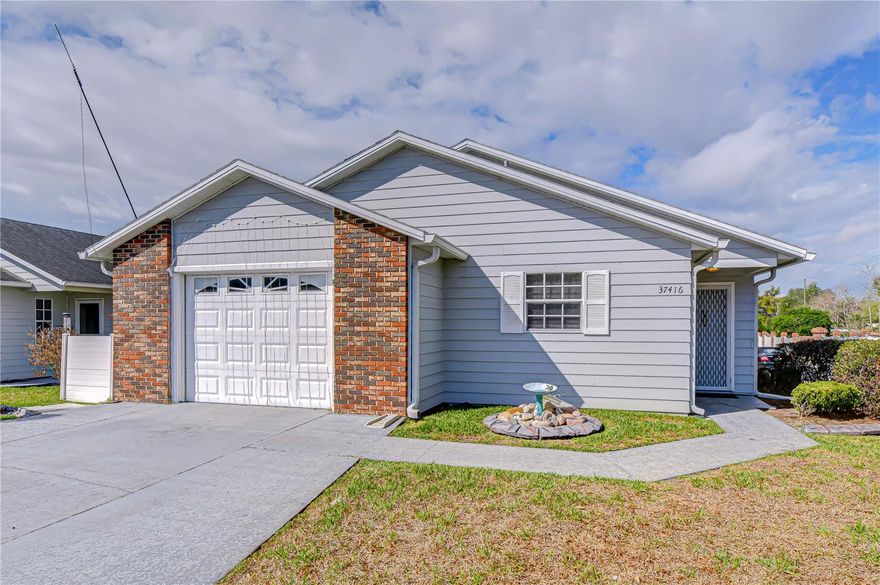 Well-maintained 2BR/2BA home with bonus room offering 1,434 sq ft in Wedgewood Manor, a fenced 55+ community. Located on a desirable corner lot with great landscaping. Tile flooring in main living areas and carpet in bedrooms. New roof, hot water tank and heating unit 2 years old.  HOA includes cable, internet, and lawn care. Active clubhouse, community pool, and shuffleboard. Conveniently located near shopping and medical facilities. Move in ready and low-maintenance living!