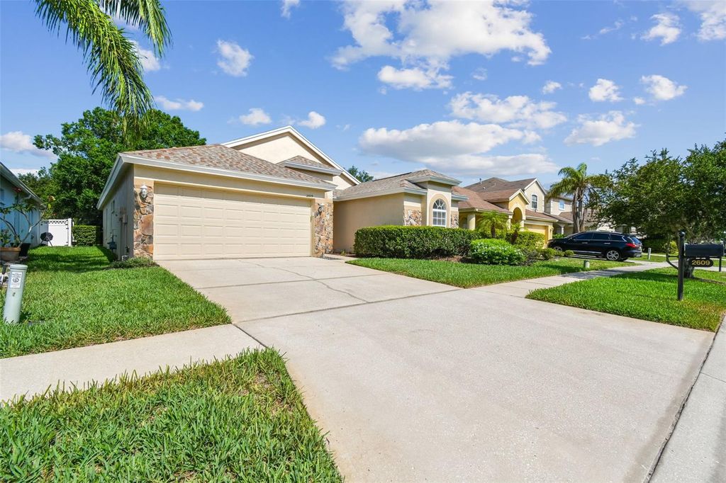 Photo of 2609 Rosehaven Drive, Wesley Chapel, FL 33544 (MLS # TB8394035)