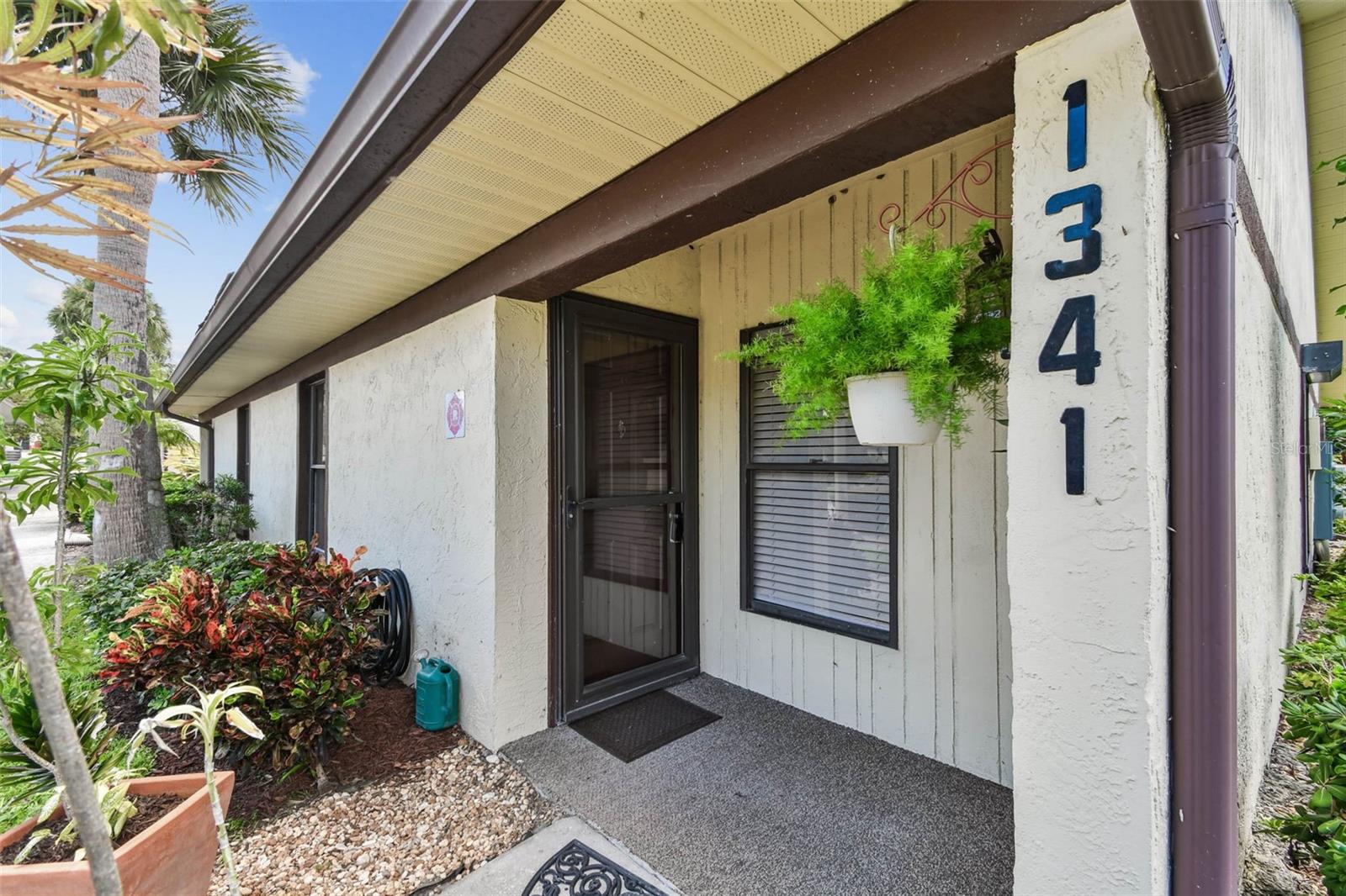 Located in the desirable San Christopher condominium complex, this fully upgraded corner unit offers a blend of modern style and exceptional convenience, just minutes from Downtown Dunedin. The interior showcases New quartz countertops, New shaker-style cabinetry, New high-end vinyl flooring, and Stainless steel appliances, including a New dishwasher and new disposal. Upgraded lighting and ceiling fans throughout elevate both functionality and comfort. A screened-in patio overlooks a tranquil preserve, offering a peaceful outdoor retreat. Roll down hurricane shutters for added protection and security. Covered parking adds to the convenience of this low-maintenance lifestyle. Community amenities include a clubhouse and sparkling pool, with close proximity to the Pinellas Trail, gulf beaches, shopping, dining, and more. Experience the best of coastal living with modern finishes and an ideal location. Schedule your private tour today.