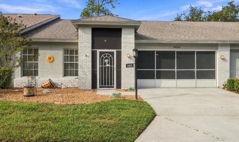 Photo of 18008 Tarrington Place, Hudson, FL 34667 (MLS # TB8554655)