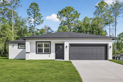Photo of 99 W Goldcoast Place, Dunnellon, FL 34434 (MLS # O6397060)