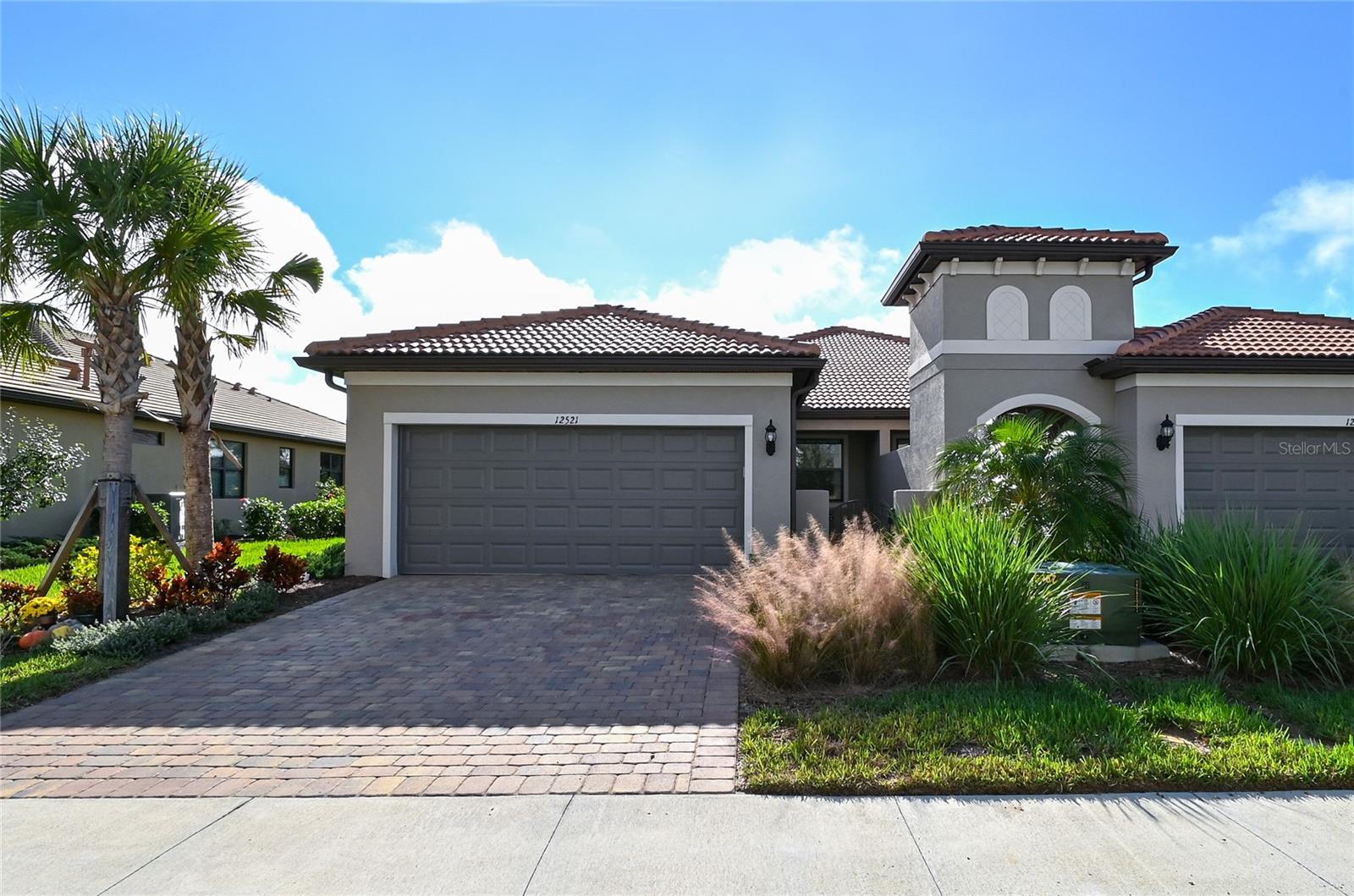 Seller will pay first year of association fees with accepted offer* Why wait to build when you can own this 2 yr. old Cressida Model in popular Hammock Preserve on Palmer Ranch* 2 bedrooms plus a den or possible bedroom with 2 full baths & 2 car garage* Beautifully appointed & upgraded maintenance free villa with private courtyard view* Upgraded wood look vinyl flooring throughout living area* Upgraded Kitchen with white cabinets, quartz counters, whirlpool stainless appliances* Glass front entry door* Whole house filtration system* Impact windows & doors makes this home very quiet inside & reduces insurance costs* Quartz counters in both bathrooms* Private screened lanai with garden walled view* Hurricane impact windows & doors* This floor plan has a front entry unlike most others* Expanded easement on one side for additional privacy* Furniture available at additional cost* Hammock Preserve is a lifestyle resort community with numerous amenities including clubhouse with activity director, heated Olympic pool & jacuzzi, tennis, pickleball, fitness & much more* Centrally located on Palmer Ranch near shopping & minutes from world famous Siesta Key Beach*