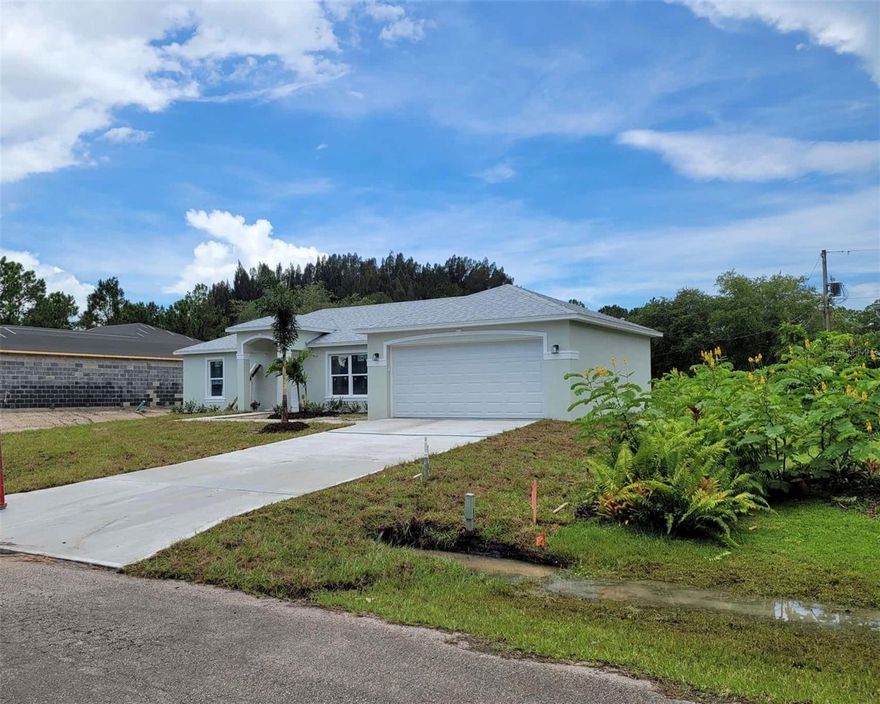 Stunning 2022-built concrete block home situated on a spacious 0.28-acre interior lot with no HOA or CDD fees! This impeccably maintained residence offers an expansive open-concept floor plan designed for modern living, featuring a gourmet kitchen with contemporary cabinetry and a private master suite with a double-vanity en-suite bath and massive walk-in closet. Step outside to your private outdoor oasis, which comes fully equipped with a large above-ground pool for summer fun, a substantial storage shed for extra equipment, and an Eastern-facing rear lanai that provides a perfectly shaded retreat for afternoon relaxation. Built to the latest energy-efficient standards to help ensure lower insurance premiums, this home offers the luxury of a nearly new build with all the essential extras already included. Conveniently located in Southwest Palm Bay near Bayside Lakes shopping and dining, this move-in-ready property is ready for its new owners—schedule your private tour today!