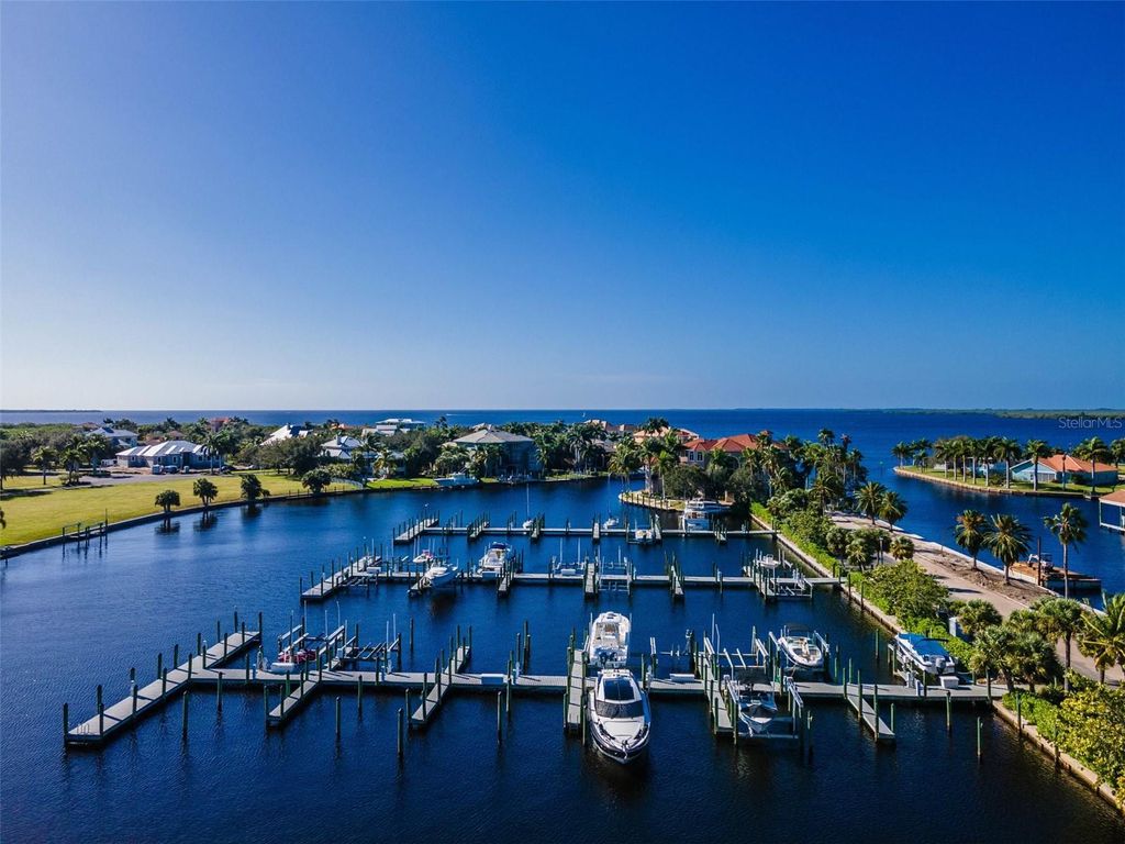 Photo of 4661 Grassy Point Boulevard, Port Charlotte, FL 33952 (MLS # C7517511)