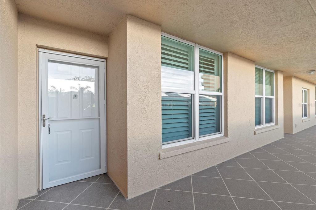Photo of 3740 Pinebrook Circle #105, Bradenton, FL 34209 (MLS # A4674876)