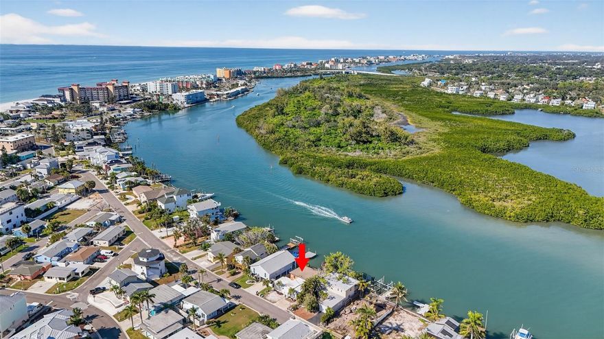 Exceptional opportunity to own this waterfront property in the highly sought-after Redington Shores community, featuring breathtaking views. Perfectly situated along one of the most desirable stretches of the Intracoastal Waterway, this property enjoys a calm no-wake zone, offering an unbeatable blend of location, lifestyle, and value.
Enjoy unobstructed, wide-open water views from your private dock—with no homes across the channel—only the natural beauty of mangroves and coastal wildlife where dolphins and manatees are often spotted. Experience the essence of waterfront living—spend your days boating, fishing, or paddleboarding on the Intracoastal, or take a short stroll to your private beach access. Residents enjoy access to the exclusive Surfside Beach Club, offering private beach parking, picnic areas, outdoor showers, and a beautiful beachfront setting ideal for sunsets or relaxation. This sought-after coastal community provides the perfect balance of boating convenience and beachside leisure.
This waterfront home was taken down to the studs following flooding from Hurricane Helene, offering a solid foundation for renovation or rebuilding. The existing four-bedroom, two-bath framework, including space for two kitchens or an in-law suite, offers flexibility for a thoughtful redesign tailored to your needs. The home is configured with three structural openings for sliding glass doors along the waterfront side, enhancing the home’s indoor-outdoor living space. The existing dock provides direct access to the Intracoastal Waterway and presents an excellent opportunity for complete reconstruction, maximizing the property’s waterfront potential. Boaters enjoy direct Gulf access and a variety of waterfront dining options along the intracoastal, as well as a quick scenic ride to John’s Pass for additional restaurants, shopping, and entertainment.
Whether you choose to renovate, elevate, or rebuild, this property offers the perfect blank canvas to create your own luxury coastal retreat—combining prime location, waterfront lifestyle, and outstanding value. Property sold as is. Don’t miss the opportunity to make this exceptional waterfront location your own.