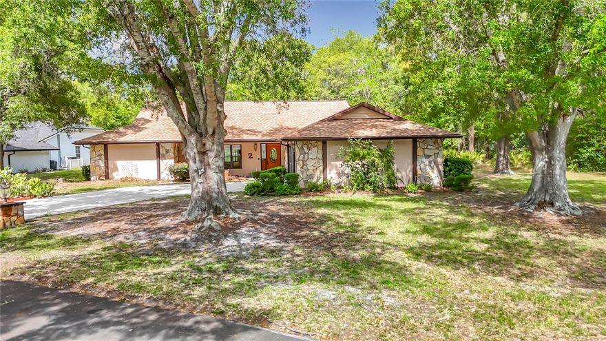 Nestled in the heart of Sugarmill Woods, this well-maintained pool home sits on a spacious .38 corner lot and features 3 bedrooms and 3 full baths. Step into an inviting open floor plan with cathedral ceilings, designed for both comfort and functionality. The eat-in kitchen is a chef’s dream, offering abundant cabinetry, pull-out soft-close drawers, granite counters and sliding doors that lead to the pool. The primary suite boasts sliding doors leading directly to the sparkling pool, with the master bath featuring dual sinks, a walk-in closet, and a tiled shower. The second bedroom is generously sized and features new carpet, while the third bedroom also shares a well-appointed bath, ideal for family or guests. A dedicated laundry room presents two pantries, a built-in desk, and ample cabinet storage for effortless organization. Enjoy year-round outdoor living on the expansive screened lanai, complete with a third full bath and a stunning diamond brite pool—perfect for entertaining or relaxing family gatherings. A separate patio area provides space for grilling. An extended driveway leads to the oversized two-car side-entry garage, offering plenty of parking and storage. This exceptional home blends comfort, practicality, and outdoor enjoyment, making it a true retreat in Sugarmill Woods. Recent updates include Roof 2024, AC 2018, newer water heater, newer pool filter, new interior paint, new floors, screens on lanai 2024, a built-in shed for additional storage. LOW HOA fees. Lots of shopping and favorite local dining options nearby. It is conveniently located near Homosassa Springs, Citrus County’s Nature Coast and close to the Gulf to enjoy fishing, boating, Kayaking and so much more. Optional membership at the Sugarmill Woods Country Club offers a variety of amenities, including two golf courses, tennis courts, pickleball courts, a gym, a Jr Olympic-sized swimming pool, a tiki bar, and a restaurant. Easy access to the Suncoast parkway for quick access to the airport, Tampa, Clearwater and St. Pete Beaches (Ranked in the top 5 Beaches in the US), also close to the famous Tarpon Springs Sponge Docks. Enjoy everything Tampa Bay has to offer from the new Downtown Riverwalk, TOP US BEACHES, boating, fishing, golfing, cultural entertainment, and museums...and of course beautiful year-round weather!