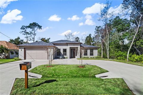 Photo of 11 Ethan Allen Drive, Palm Coast, FL 32164 (MLS # FC310043)