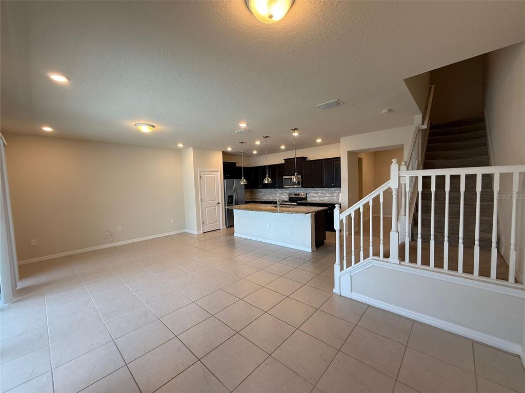 Photo of 607 Jasmine Lane, Davenport, FL 33897 (MLS # O6333771)