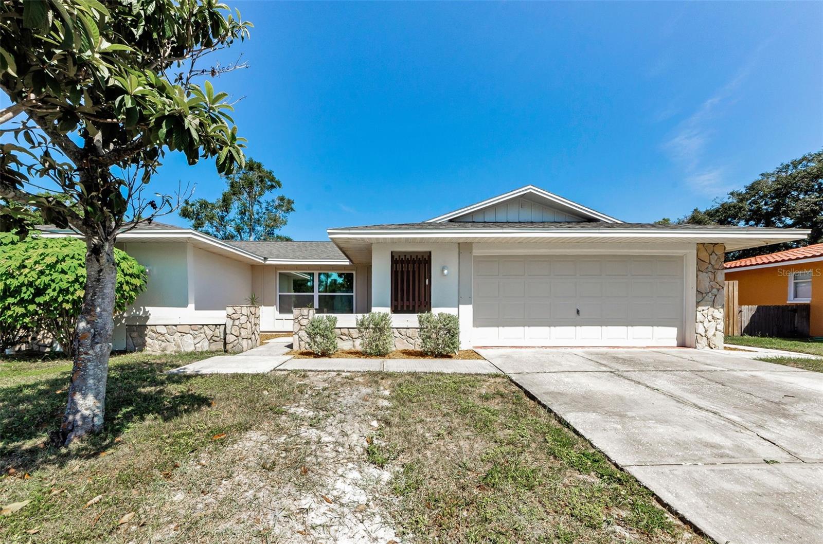 Completely Remodeled Pool Home in Orchid Lake – 6735 Pin Cherry Lane, Port Richey, FL.
Welcome to your dream home in the highly desirable Orchid Lake community. This beautifully updated property offers 3 bedrooms, 2.5 bathrooms, a 2-car garage, and 1,832 square feet of living space with a split-bedroom layout and open-concept design. Situated on a spacious one-third-acre pie-shaped lot at the end of a quiet cul-de-sac, the home provides exceptional privacy with no rear neighbors and a concrete wall at the back of the property. The backyard is a true oasis featuring a large in-ground saltwater pool, an electric pool heater, a screened enclosure, and a generous patio perfect for entertaining.
Inside, the home has been completely remodeled with a modern touch. The open kitchen includes granite countertops, stainless steel appliances, updated cabinetry, and an island with a built-in cooktop. The spacious dining area features a stylish shiplap accent wall. The primary suite includes a walk-in closet and a renovated en-suite bathroom. Two additional bedrooms are connected by a Jack & Jill bathroom with dual sinks, and there is a convenient half bathroom for guests. An indoor laundry room with a full-size washer and dryer adds to the home's functionality, and all appliances are included. Nearly every room in the house offers panoramic views of the pool area.
Significant updates include a new HVAC system in 2024, new ductwork in 2025, a water heater installed in 2021, kitchen renovation and appliances in 2021, bathroom renovations in 2019, an electric pool heater added in 2022, a screened pool enclosure installed in 2023, resurfacing of the pool in 2016, fresh interior and exterior paint in 2024 and 2025, and a newer wood fence on one side added in 2024. There is no HOA and no flood insurance required. The home is conveniently located near major roads, shopping centers, and the beautiful Gulf Coast beaches. This is a turn-key, move-in ready home on one of the largest lots in the neighborhood. Schedule your private showing today.