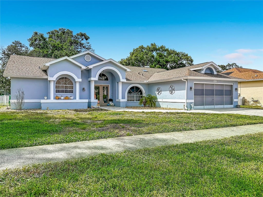 Photo of 1051 Hook Drive, Spring Hill, FL 34608 (MLS # W7889914)