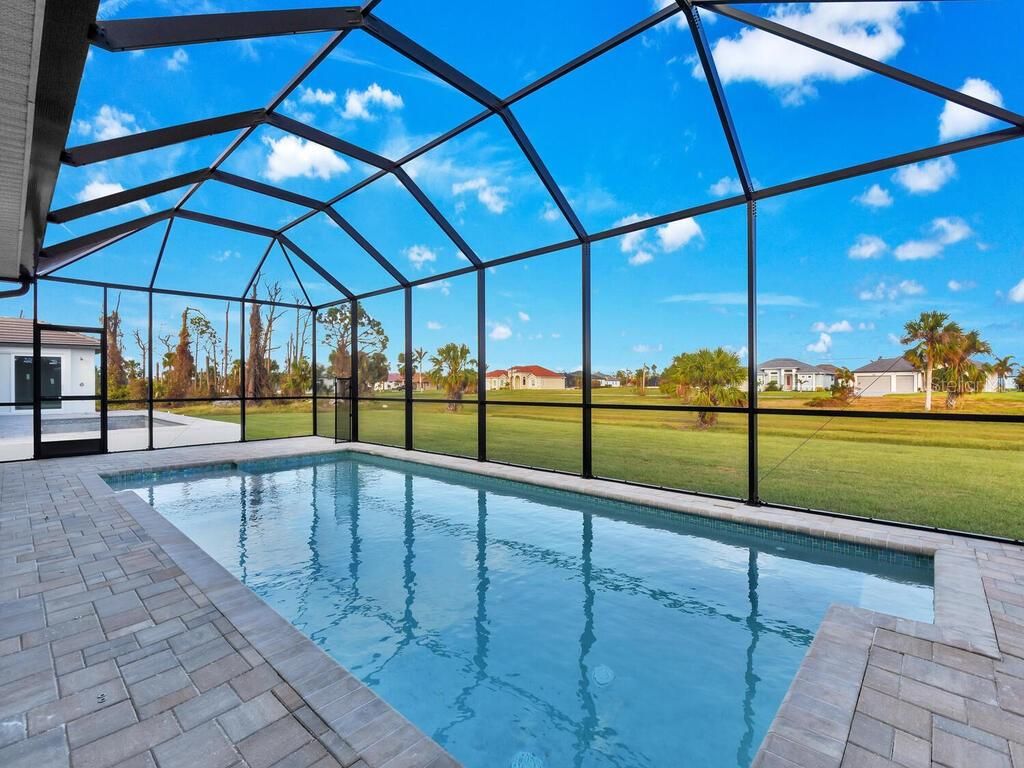 Photo of 193 Rotonda Boulevard S, Rotonda West, FL 33947 (MLS # O6302053)