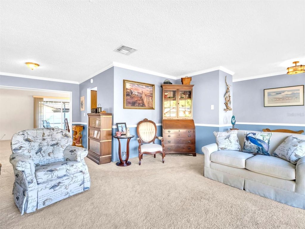 Photo of 811 Helmsman Way, Palm Harbor, FL 34685 (MLS # TB8475651)