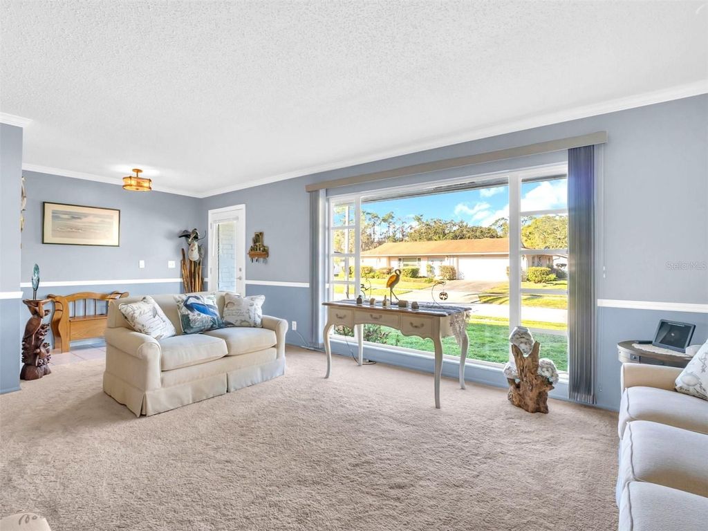 Photo of 811 Helmsman Way, Palm Harbor, FL 34685 (MLS # TB8475651)