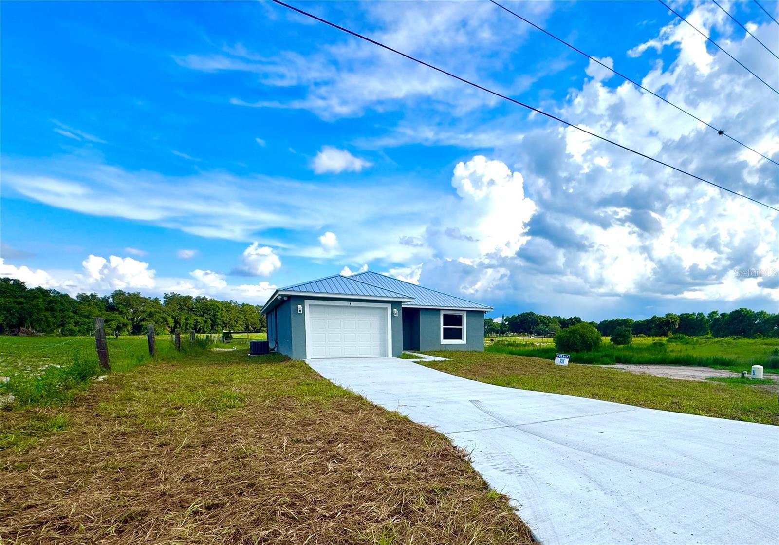 Brand new 3-bedroom, 2-bath home situated on a spacious 1-acre lot. Features include a metal roof, granite countertops throughout, durable vinyl flooring, and brand new kitchen appliances. Open-concept layout offers modern living with ample natural light. Outdoor space provides plenty of room for recreation, storage, and entertaining. Guest bathroom boasts granite counter tops and a tub with a nice tiled surround. Master bedroom features a walk in closet, walk into the master bath which features his and her sinks and a nice tiled shower. When you exit your back door your yard opens up to breath taking views to include a small pond at the rear corner of the property.
Move-in ready and priced to sell—schedule your private showing today!