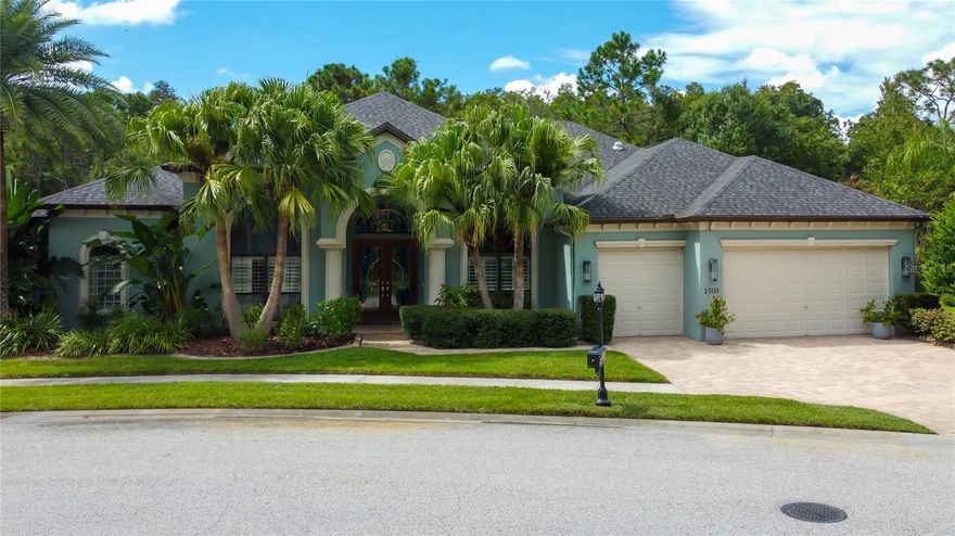 Welcome to this stunning custom-built home in the gated community of Grey Hawk.  This beautiful 3,111 sq. ft. single floor home offers 3 large bedrooms, 3 full bathrooms, office, and a 3-car garage. Perfectly situated on a large conservation lot with pond views, this residence combines luxury and comfort with thoughtful details throughout. Inside, you’ll find an open and elegant floor plan featuring a formal living room, formal dining room, and a dedicated office with built-in desk space. The gourmet kitchen flows seamlessly into the main living areas, ideal for both entertaining and everyday living.  Extra features include a new roof (2024), wood floors in office and family room, a central vacuum system, water softener, electric fireplace, and a smart thermostat for modern convenience.  Step outside to your private retreat — a screened and covered lanai with a saltwater pool, newer propane-heated spa with new filter, and a fully equipped outdoor kitchen. Large green space for sports, kids or pets.  This space is designed for year-round enjoyment and relaxation.  Grey Hawk offers amenities including a community tennis court, playground, dock, and fishing on scenic Lake Polo. With its blend of elegance, functionality, and a prime location, this home is a must-see! Close to restaurants, shopping, entertainment, hospitals, and a short ride to beaches, airports, highways, and down town Tampa.