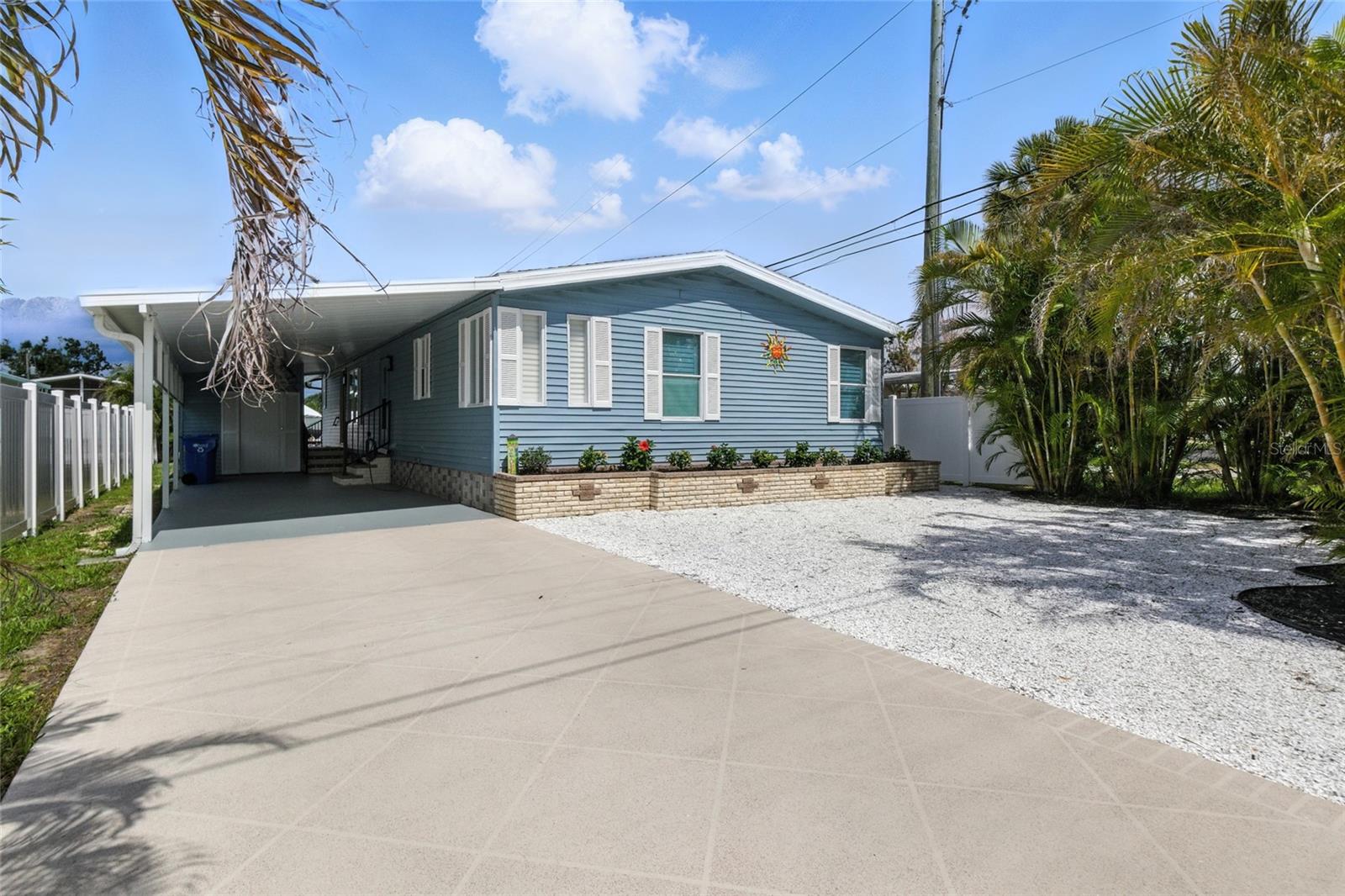 A One-of-a Kind Dream or Vacation Home in the Heart of Venice
Discover this beautifully renovated 2-bedbroom, 2-bath coastal retreat where every inch has been thoughtfully updated for style, comfort, and easy living. From the moment you step inside, you’ll fall in love with the light and bright kitchen featuring an oversized bar perfect for casual dining or entertaining. The luxury vinyl plank flooring throughout sets a warm, modern tone, complemented by an entertainment wall complete with a wine rack and beverage refrigerator —ideal for hosting in style.
The spacious main suite offers a true escape, with a large bedroom, upgraded ensuite bathroom and walk in closet. The guest bedroom boasts a welk-in closet and its own updated bath, illuminated by a charming skylight.
Stretch out and enjoy the outdoors in the large lanai that spans the back of the home---perfect for soaking in views of the private backyard and canal. Step outside to a French garden-inspired fire pit, ideal for cozy evenings under the stars.
Location? It doesn’t get better. Jump in your boat and be on the Intracoastal Waterway in minutes. Walk across the street to Dockside for sunset cocktails and dinner or across the bridge into the heart of quaint, vibrant downtown Venice. You’re just one mile from the beach, with direct access to the Legacy Trail for walking and biking adventures.
This is not just a home—it’s a lifestyle. Unique, move-in ready and offered at an amazing price. A furniture package is also available to your move even easier. No HOA and No CDD!!
Truly one of a kind—don’t let this gem slip away!