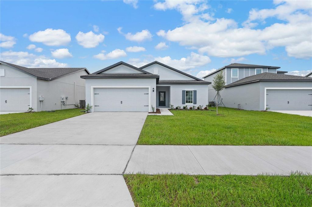 Photo of 13258 Tula Loop, Astatula, FL 34705 (MLS # TB8491039)