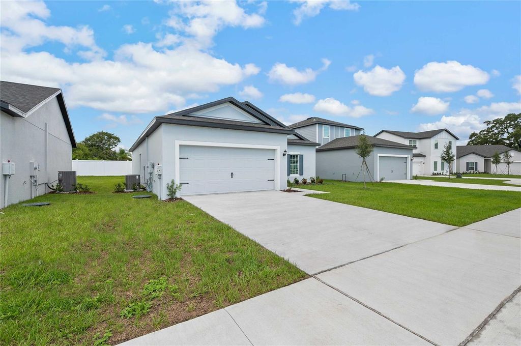Photo of 13258 Tula Loop, Astatula, FL 34705 (MLS # TB8491039)
