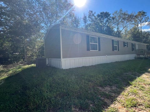 Photo of 10760 NE 114th Street, Archer, FL 32618 (MLS # O6453815)