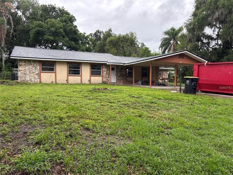 Photo of 2035 Voltaire Street, Lakeland, FL 33801 (MLS # O6419936)