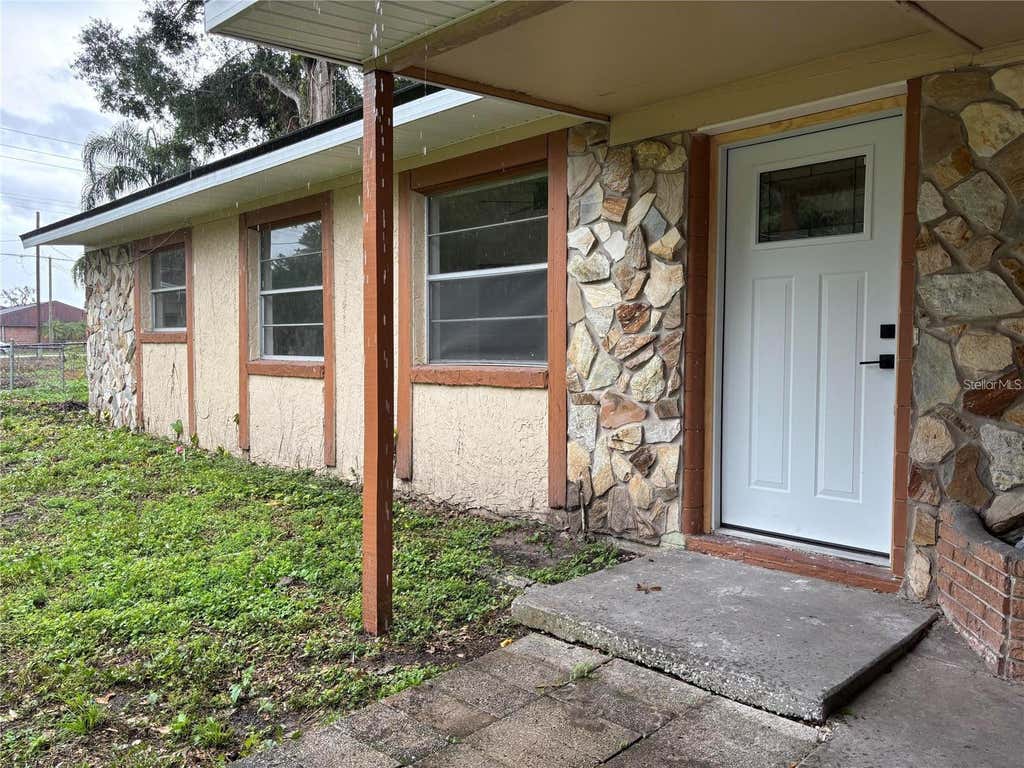 Photo of 2035 Voltaire Street, Lakeland, FL 33801 (MLS # O6419936)