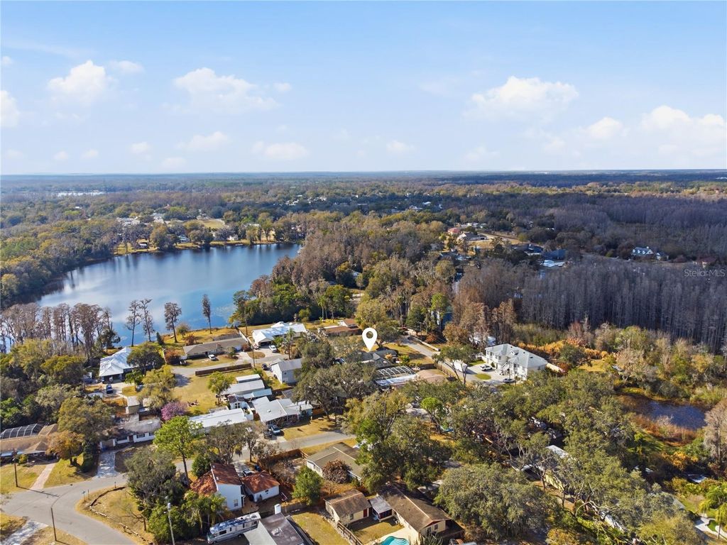 Photo of 18709 Lake Commiston Drive, Lutz, FL 33549 (MLS # TB8477923)