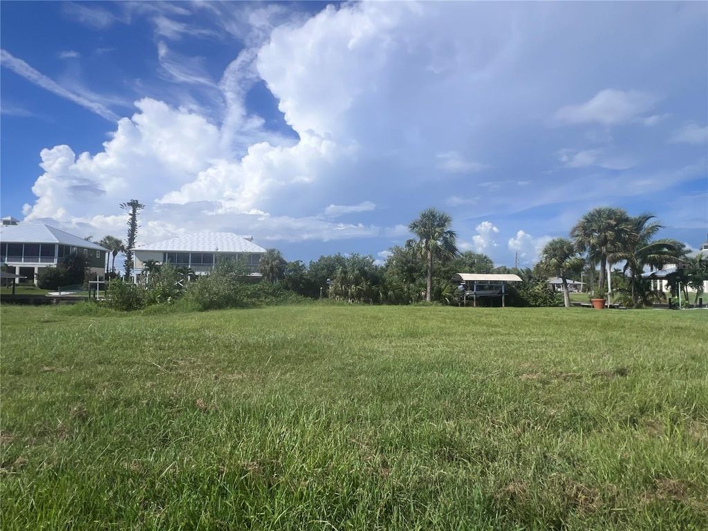 Photo of 24290 Blackbeard Boulevard, Punta Gorda, FL 33955 (MLS # A4622957)